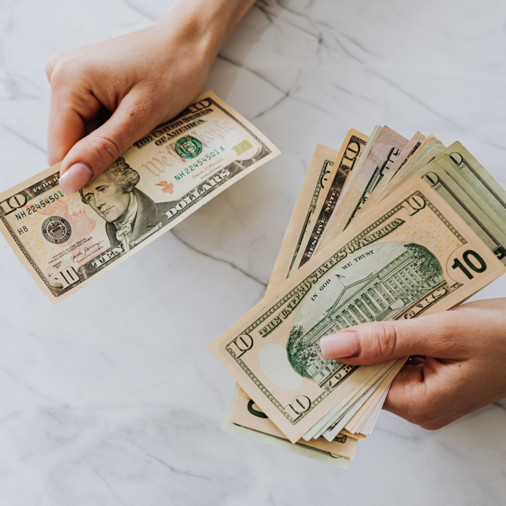 A person counting cash.